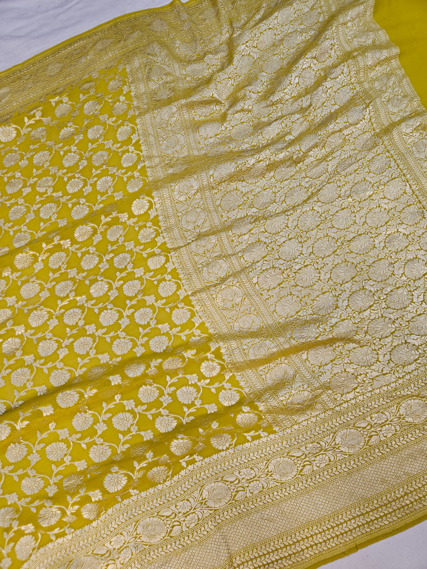 pure georgette silk banarasi woven tested zari saree in Yellow