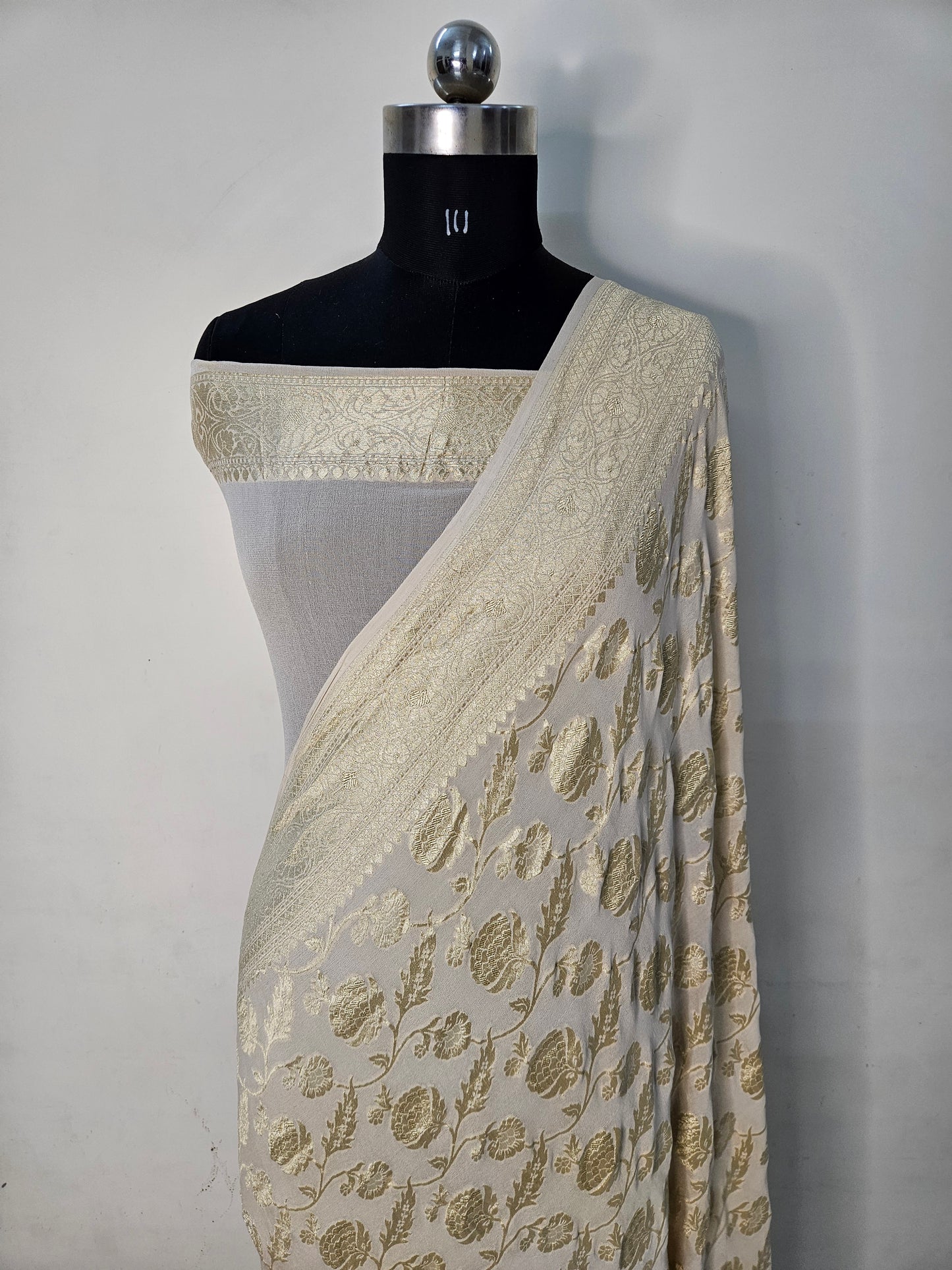 Cream Pure Georgette Banarasi Saree Jaal weaving faux watergold zari