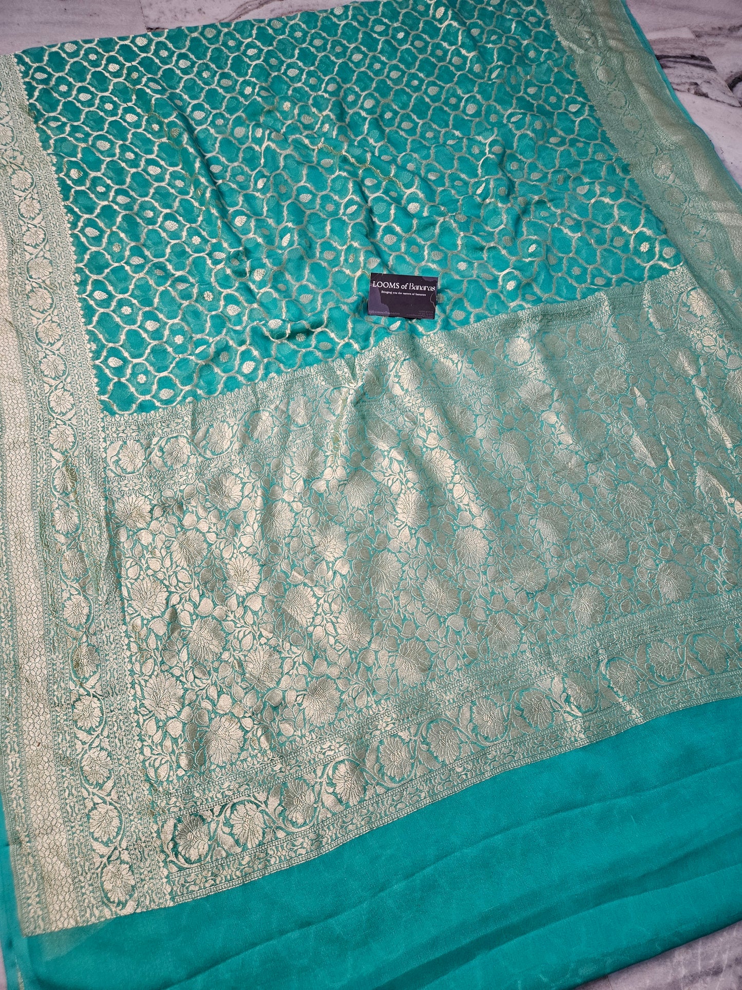 SeaGreen Pure Georgette Banarasi Saree Jaal weaving faux watergold zari