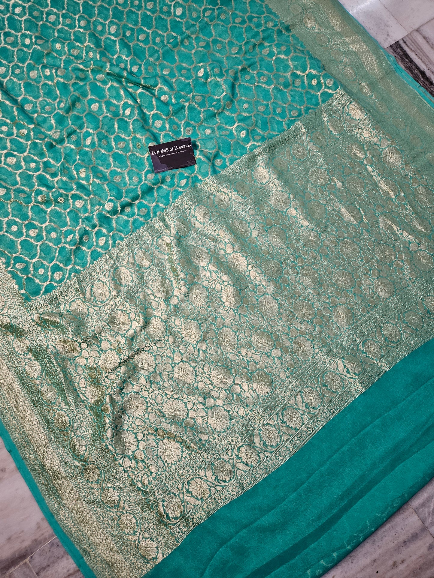 SeaGreen Pure Georgette Banarasi Saree Jaal weaving faux watergold zari