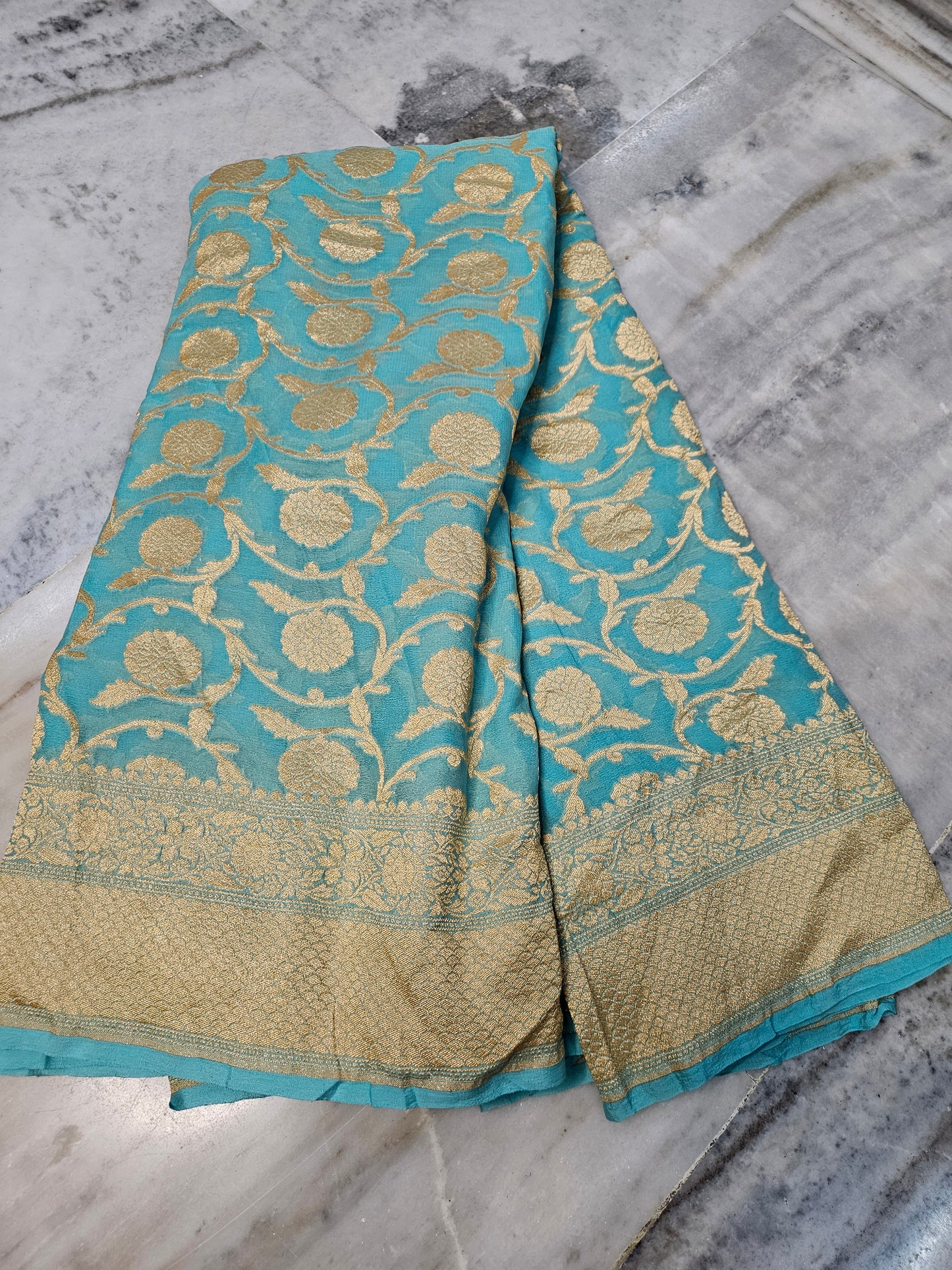 Pure Georgette Banarasi Saree weaving faux jaal nimzari in Peacock Blue