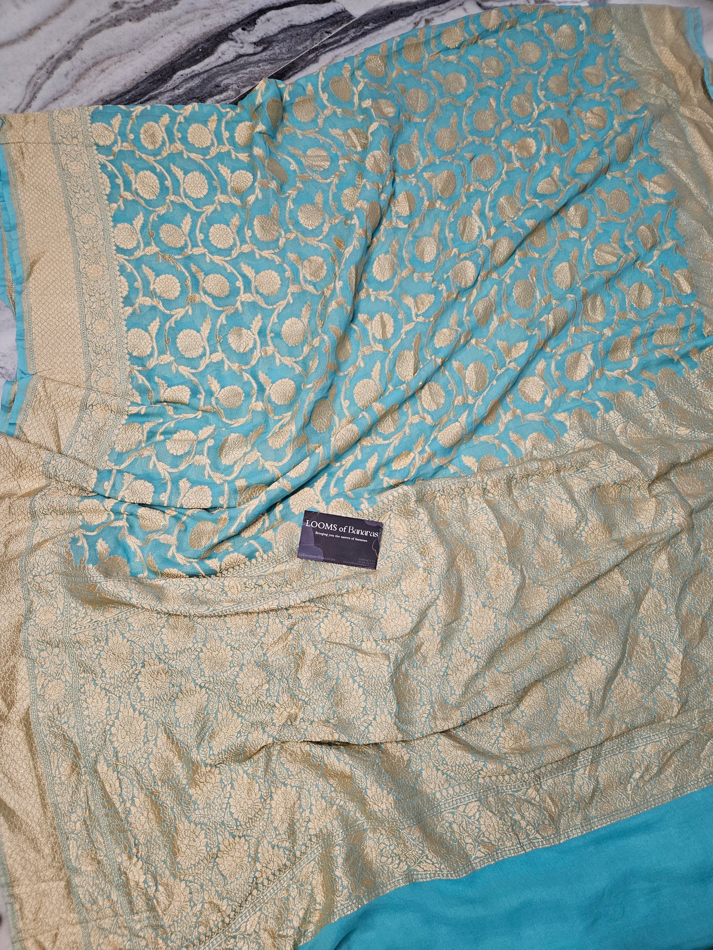 Pure Georgette Banarasi Saree weaving faux jaal nimzari in Peacock Blue