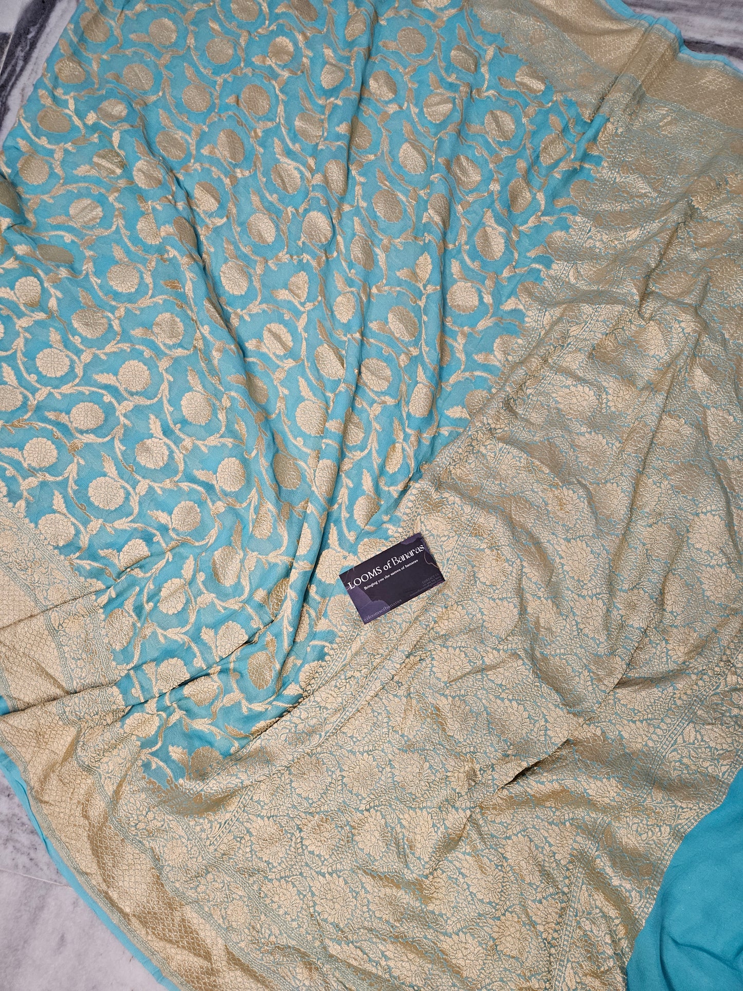 Pure Georgette Banarasi Saree weaving faux jaal nimzari in Peacock Blue