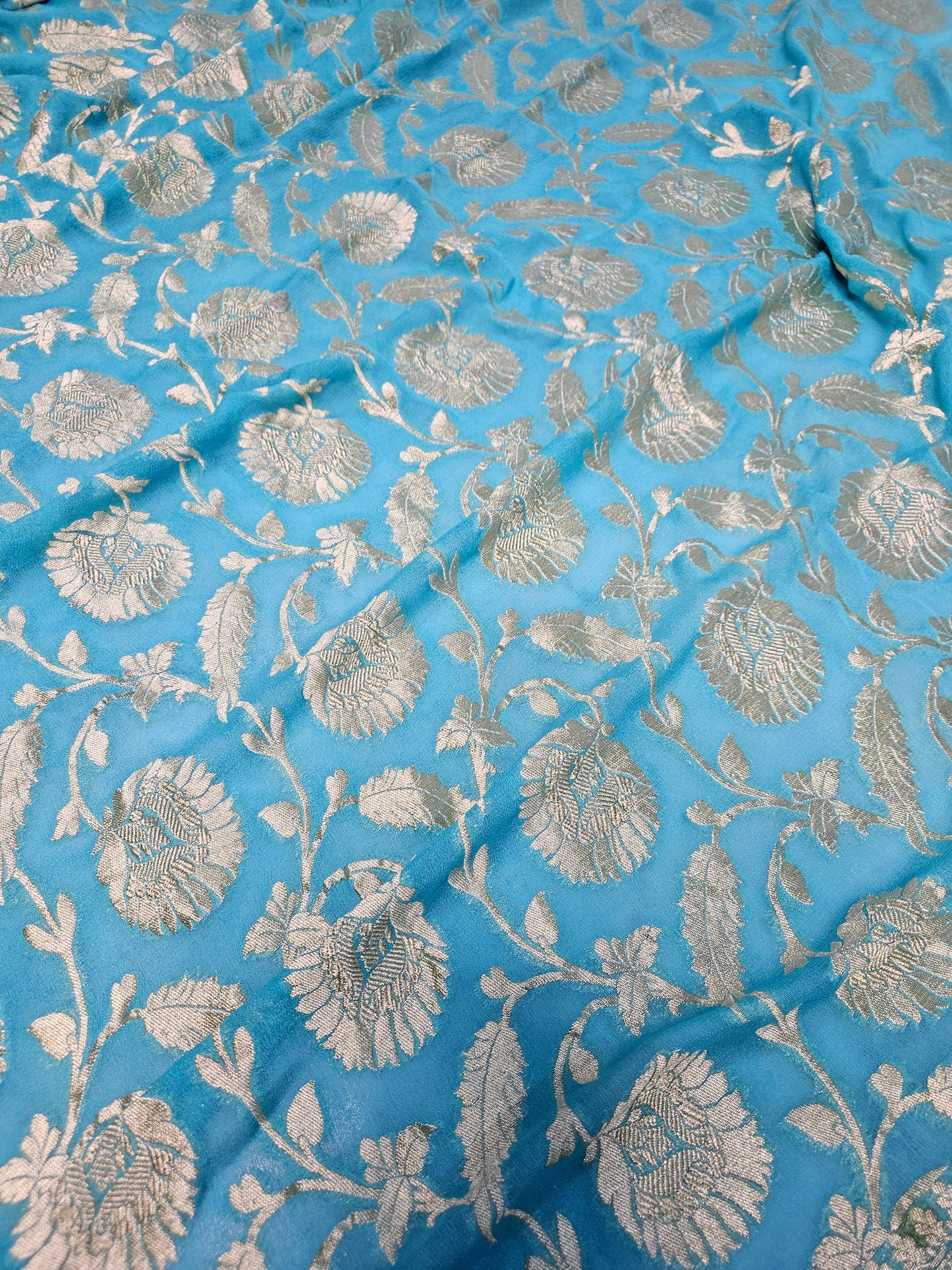 Pure Georgette Banarasi Saree weaving faux jaal watergold zari in Sky-Blue