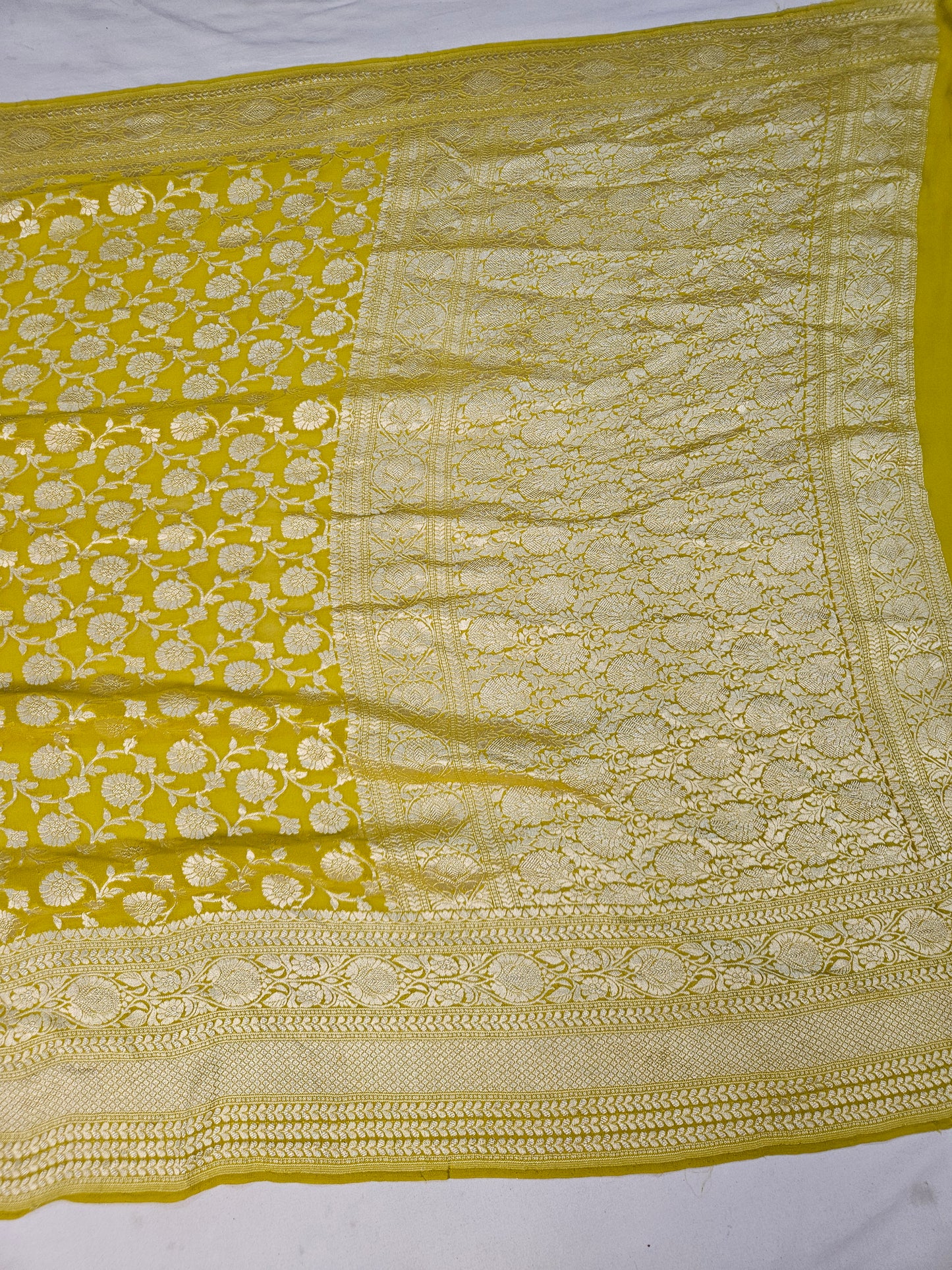 pure georgette silk banarasi woven tested zari saree in Yellow
