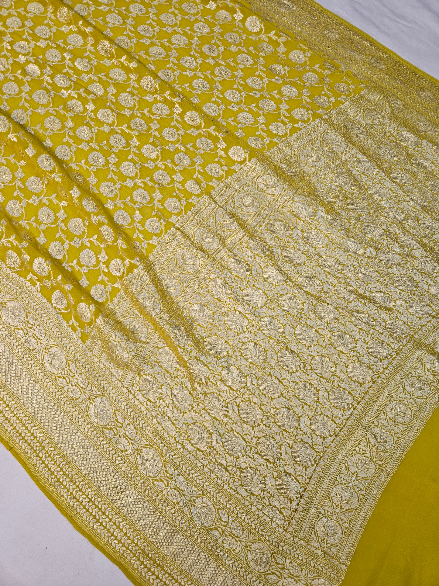 pure georgette silk banarasi woven tested zari saree in Yellow