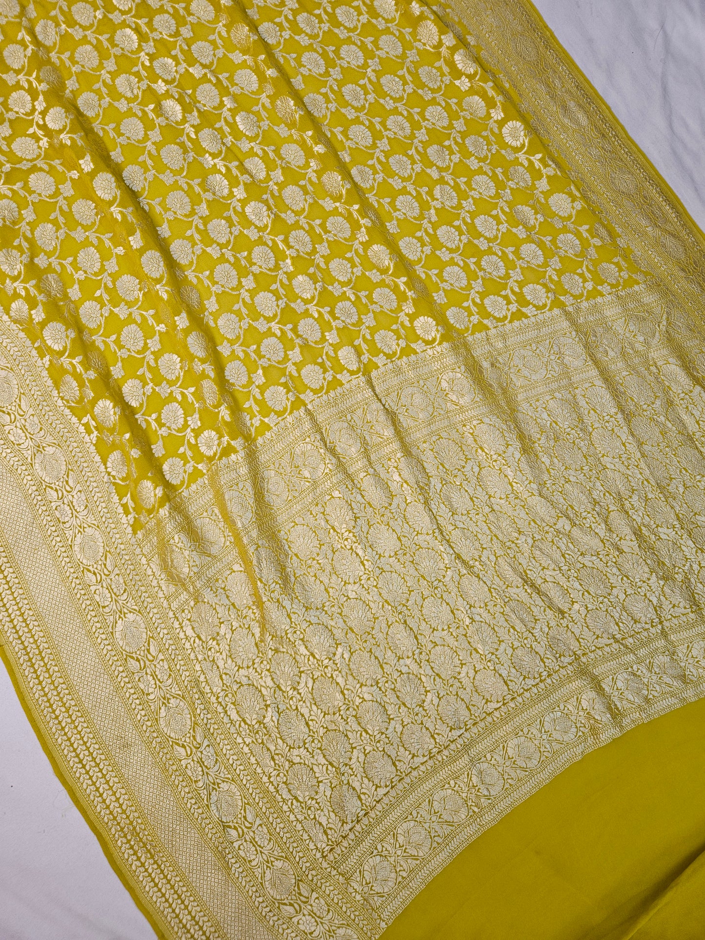 pure georgette silk banarasi woven tested zari saree in Yellow